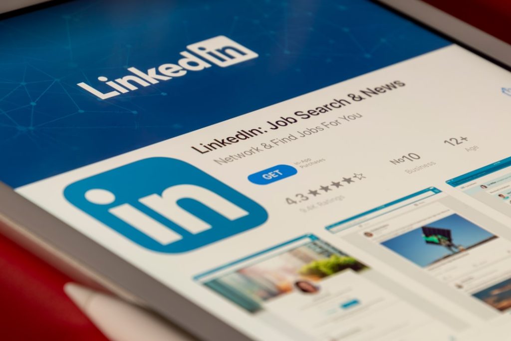 The LinkedIn app store listing open on a tablet screen, representing the personal LinkedIn account that automation tools put at risk of restriction.