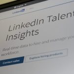 A laptop screen open to a LinkedIn page, the platform whose automation rules decide which outreach tools are safe to run on your account.
